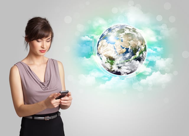 Young business woman with earth and cloud concept